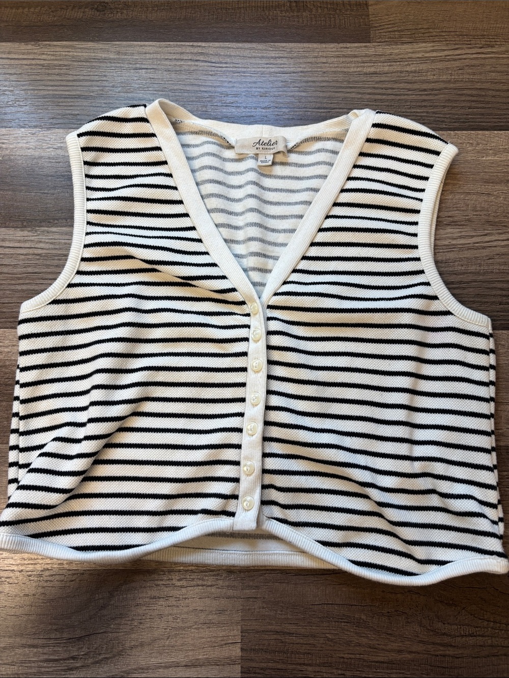 Atelier by Kirious striped knit vest features a V-neckline